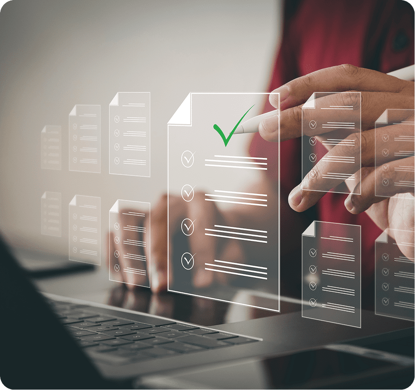 Digital checklist with green checkmark on screen.