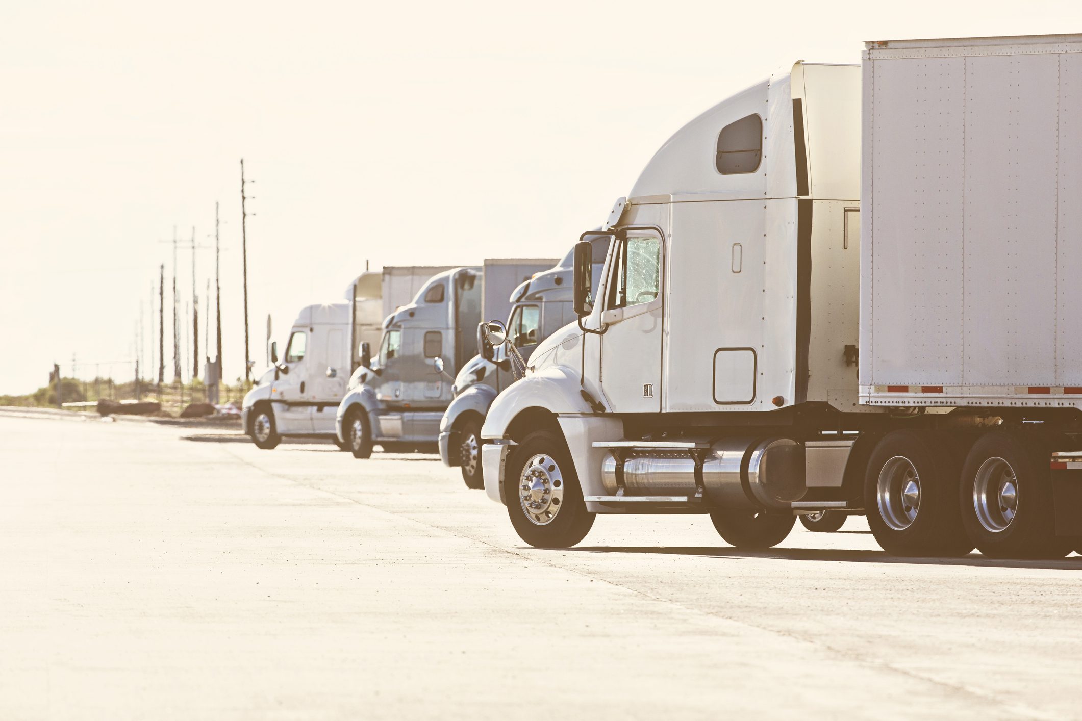 Semi trucks lined up at truck stop Please see similar images in my portfolio: